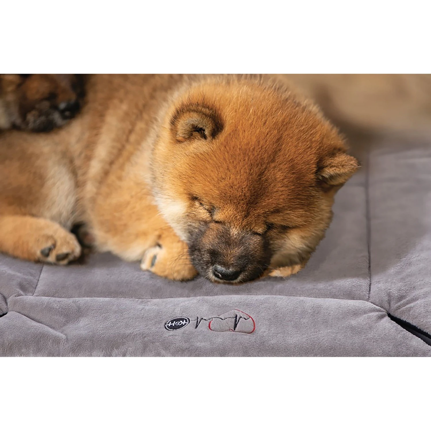 K&H Pet Products Mother's Heartbeat Fleece Puppy Crate Pad 1 K&H Pet Products Mother's Heartbeat Fleece Puppy Crate Pad